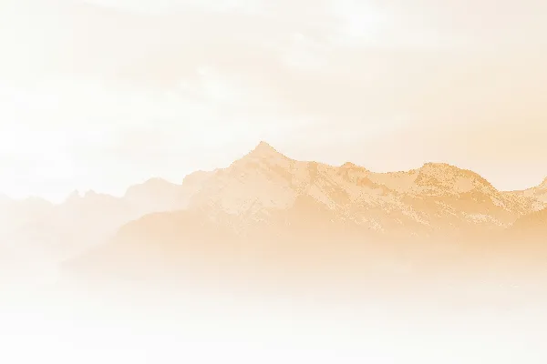 Rockies under cloudy sky during the daytime