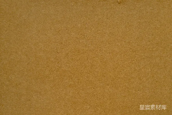 高清摄影 一张棕色的纸上有一张撕破的纸。