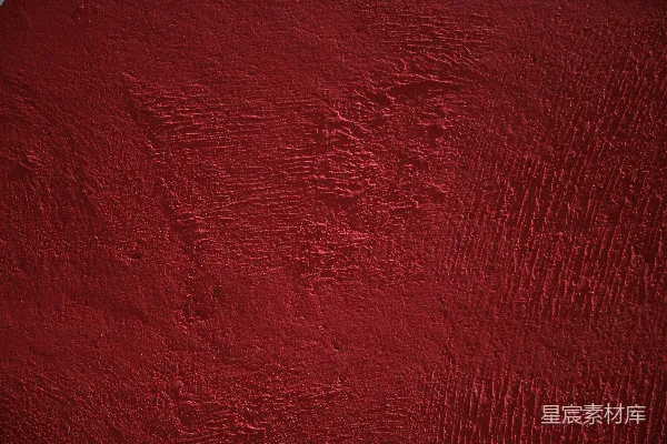 高清摄影 一张红色油漆表面的特写照片。
