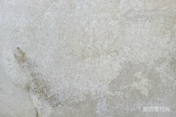 高清摄影 一堵白灰相间的墙，上面有一个钟表。