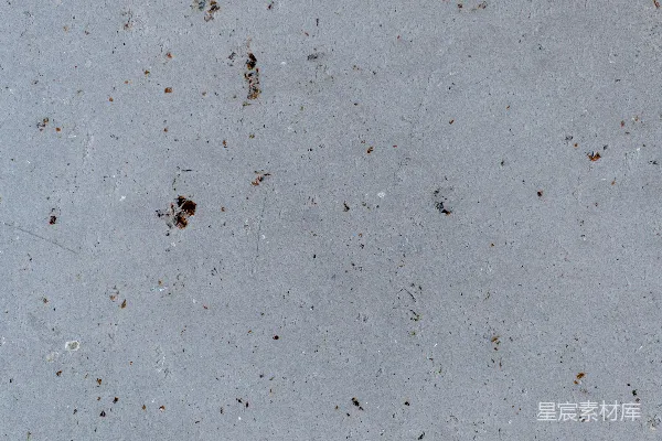 高清摄影 一张水泥表面的特写照片，上面有泥土。