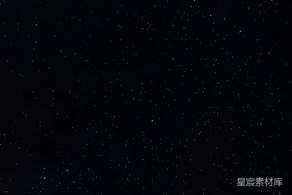 夜空中的星星和前景中的一架飞机
