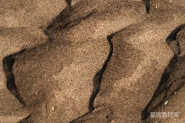 高清摄影 海滩上的沙子和水的特写