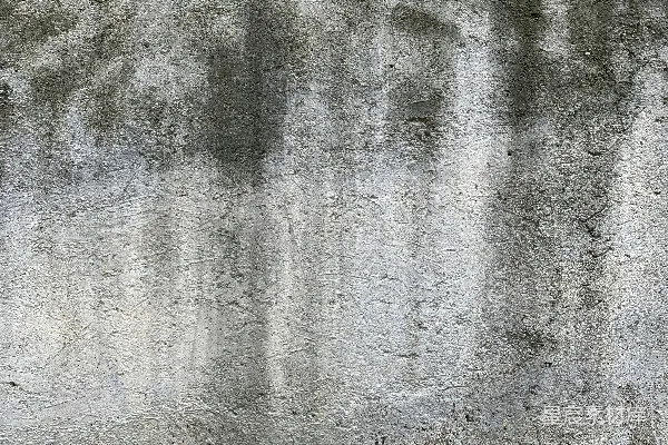 高清摄影 一座红色的消防栓坐在水泥墙前。