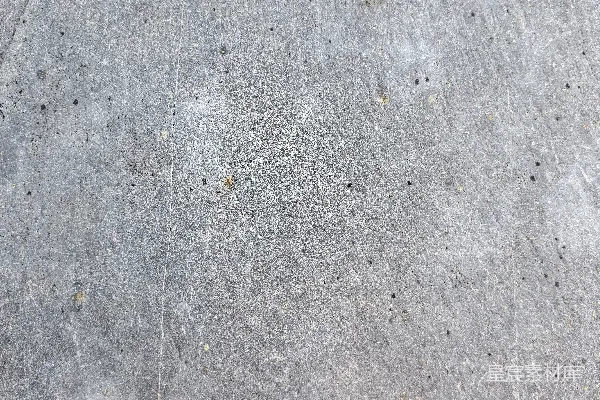 高清摄影 灰色混凝土表面，带有细小的暗色斑点。