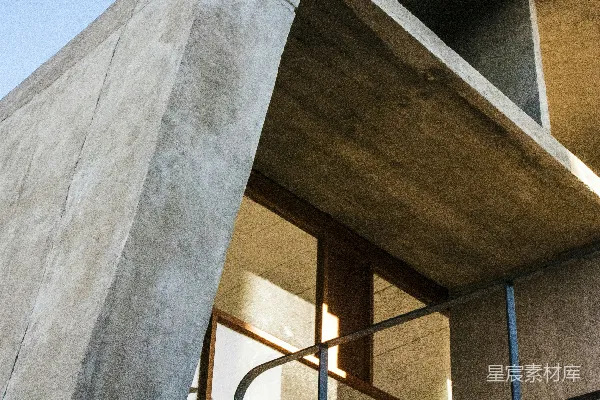 高清摄影 现代混凝土建筑，带有弯曲的屋顶和窗户。