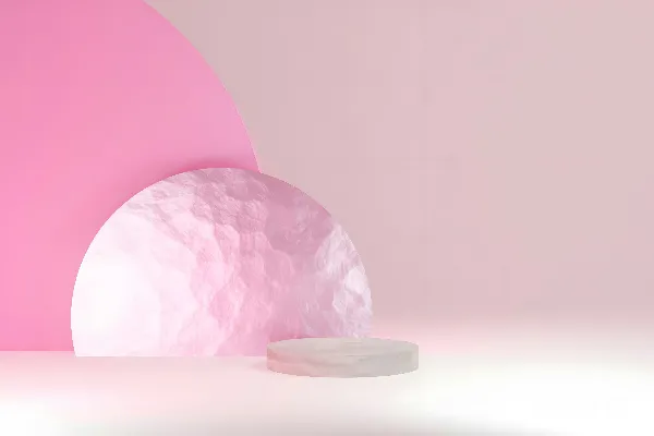 高清摄影 一个白色物体放在粉红色的地面上。