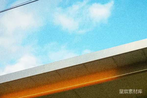 高清摄影 现代建筑边缘在明亮的蓝天背景下