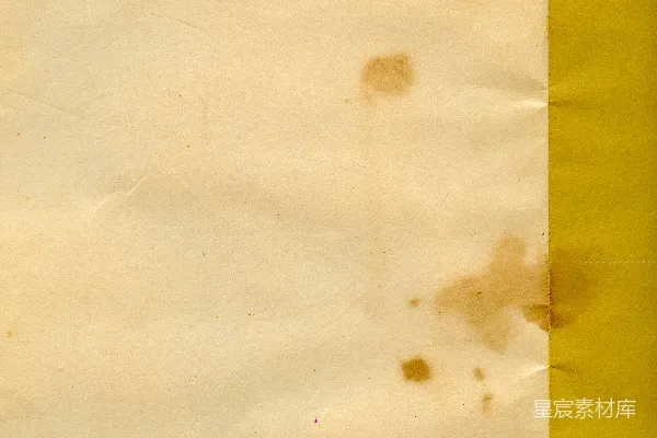 高清摄影 一张有棕色斑点的白纸