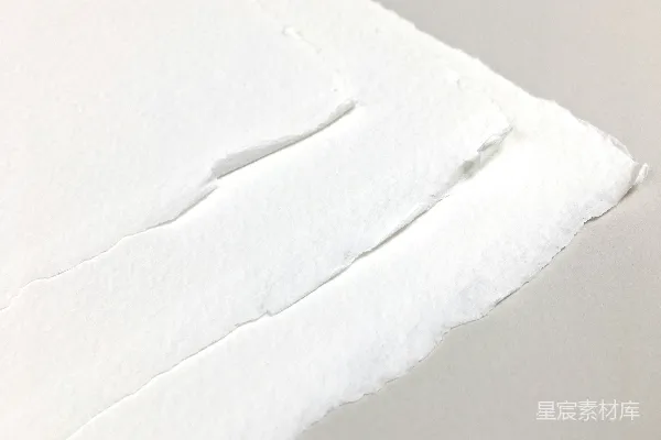 高清摄影 一张有孔的白纸