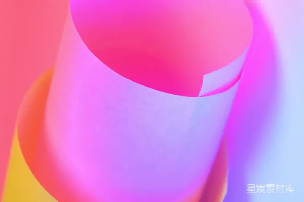 高清摄影 卷曲的纸张搭配五彩斑斓的灯光
