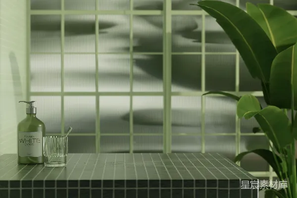 一个带有绿色瓷砖浴缸和绿色植物的浴室