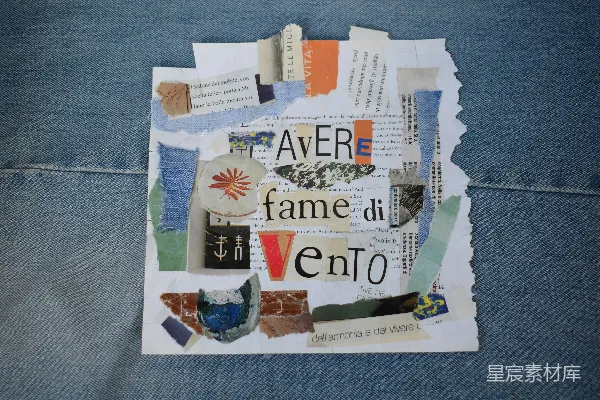 高清摄影 牛仔布上的拼贴画，上面有“avere fame di vento”（意为“渴望风”）的文字。