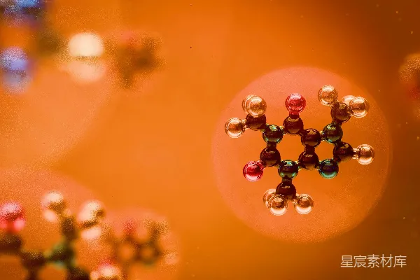 高清摄影 分子结构在橙色背景下被观察到。