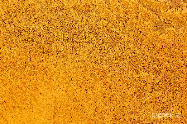 一张黄表面的特写镜头，看起来像是泥土。