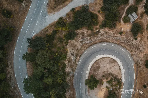 高清摄影 山间蜿蜒公路的航拍视角