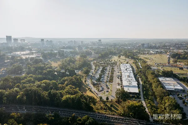 高清摄影 郊区景观的航拍图，显示了建筑物和树木。