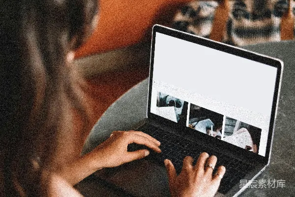 高清摄影 女人正在桌子上使用MacBook Pro