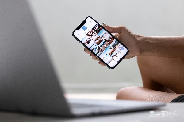 高清摄影 手持银色iPhone 6的人