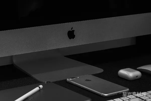 高清摄影 银色iMac，附带苹果键盘和魔法鼠标
