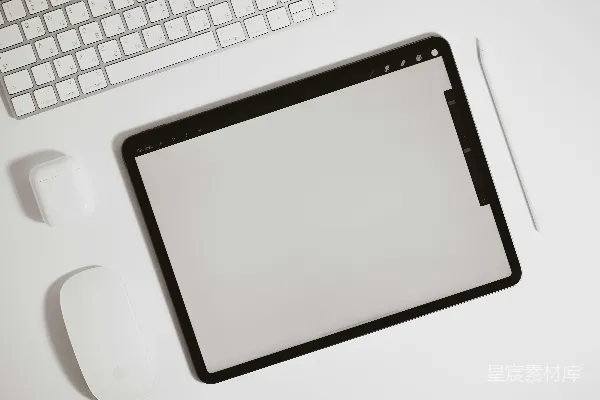 高清摄影 黑色iPad放在白色桌子上