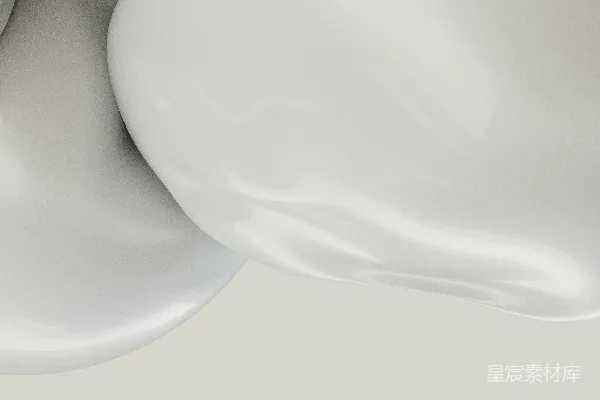 高清摄影 一张白色物体的特写，背景是灰色的。