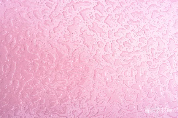 高清摄影 粉红色纹理表面的水珠特写。