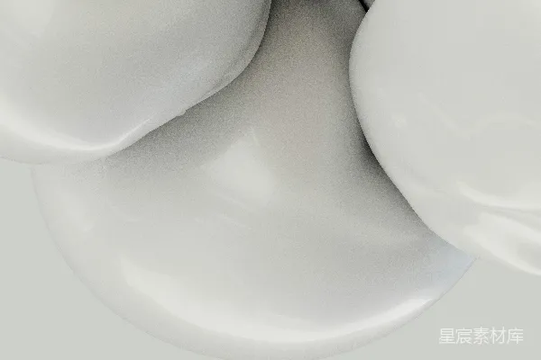 高清摄影 一张白色物体的特写照片，背景为灰色。