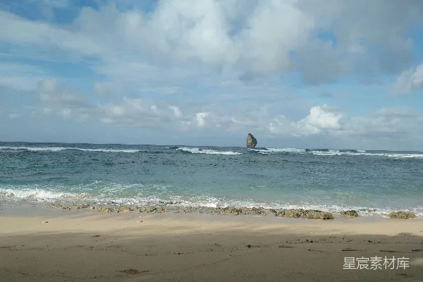 高清摄影 一个正在海浪上冲浪的人