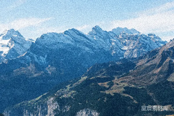 高清摄影 雄伟的雪山在晴朗的蓝天下