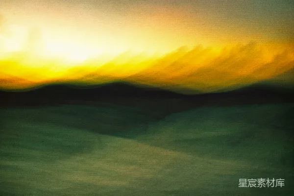 高清摄影 一张模糊的夕阳照耀着田野的照片
