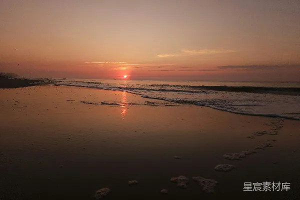高清摄影 平静海海滩的日出