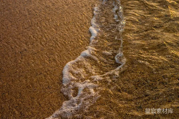 高清摄影 海滩上波浪的特写照片