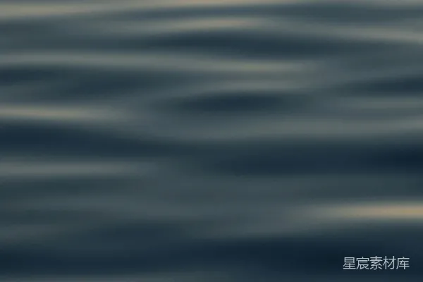 高清摄影 静谧的深蓝色水面上，轻柔的波浪荡漾。
