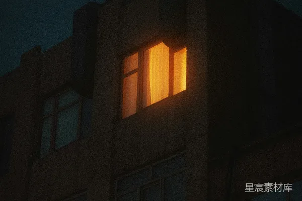 高清摄影 夜晚的一座建筑，只有窗户亮着灯。