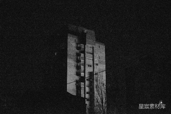 高清摄影 夜晚亮着灯的高大混凝土建筑物