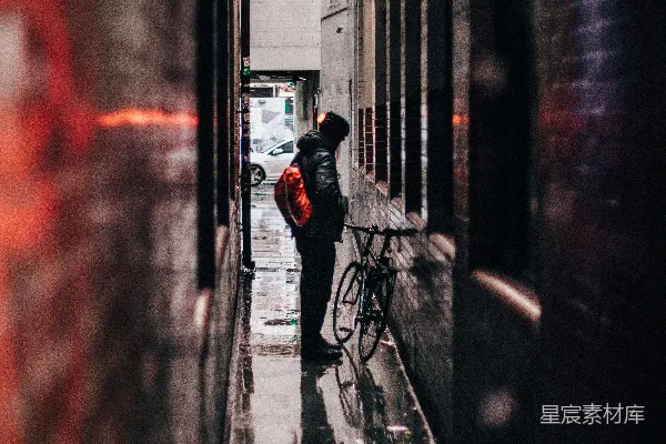 高清摄影 微移镜头拍摄的人和自行车照片