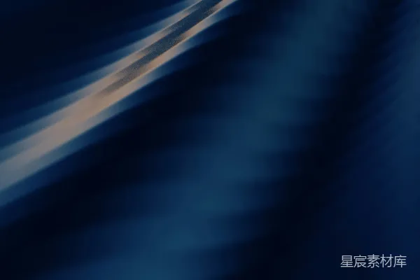 高清摄影 蓝色和白色的光带划过黑暗的背景。