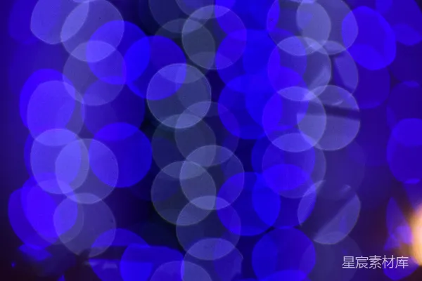 高清摄影 抽象的蓝色光斑在黑暗背景上