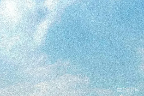 高清摄影 一座带蓝色屋顶的白色建筑，在多云的蓝天之下。