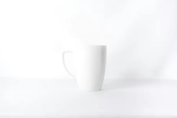 高清摄影 白杯子在白色背景前