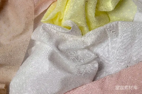 高清摄影 柔软的淡色织物，带有微妙的点状图案