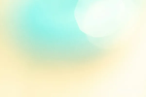 高清摄影 柔和的蓝黄渐变背景，带有光斑效果的灯光。