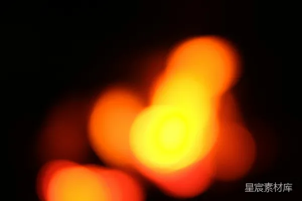 高清摄影 黑色背景上的模糊橙色和黄色灯光