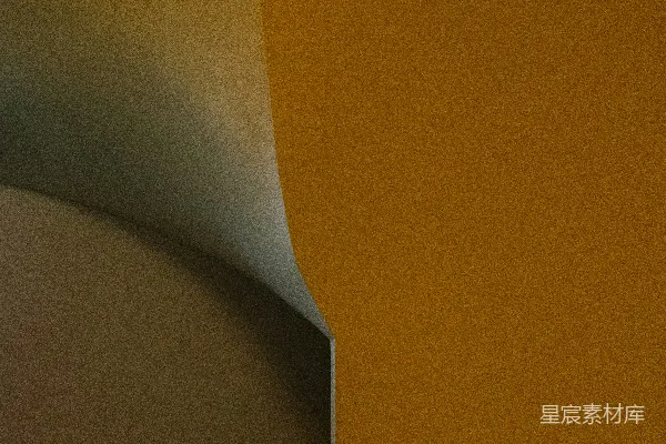 高清摄影 卷曲的纸张揭示出一堵橙色和棕色的墙。
