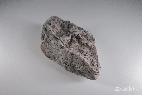 高清摄影 棕色岩石在白色表面上