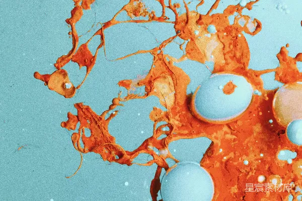 高清摄影 蓝色和橙色的液体，带有橙色和白色的泡沫。