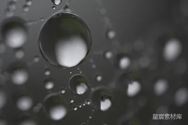 高清摄影 水滴特写，附着在表面上。
