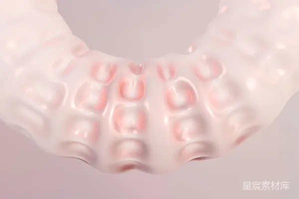 高清摄影 一个白色背景上的一件塑料物体的特写照片
