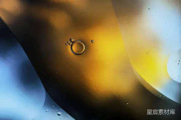 高清摄影 一滴水在黄色表面上